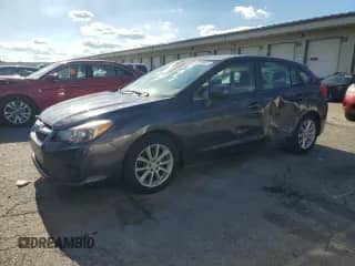2014 Subaru Impreza Premium с VIN JF1GPAC67E8287593, выставлен на аукционе Copart как лот 82109635 с пробегом 73 638 миль миль и Списание • Salvage title. История ставок и продаж доступна на DreamBid. Изображение 1.