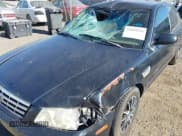 ✅ 2002 Kia Optima LX • VIN: KNAGD126425142378 • Lot: 43045936. Listed on IAAI with 259,185 mi. Free auction sales archive from the USA and detailed vehicle history report at DreamBid. Image 6.