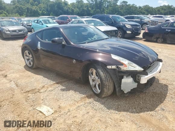 ✅ 2012 Nissan 370Z Touring • VIN: JN1AZ4EH9CM561796 • Lot: 60938314. Wystawiony na Copart z przebiegiem 59 011 mil. Bezpłatny archiwum sprzedaży aukcyjnych z USA i szczegółowy raport historii pojazdu na DreamBid. Zdjęcie 4.