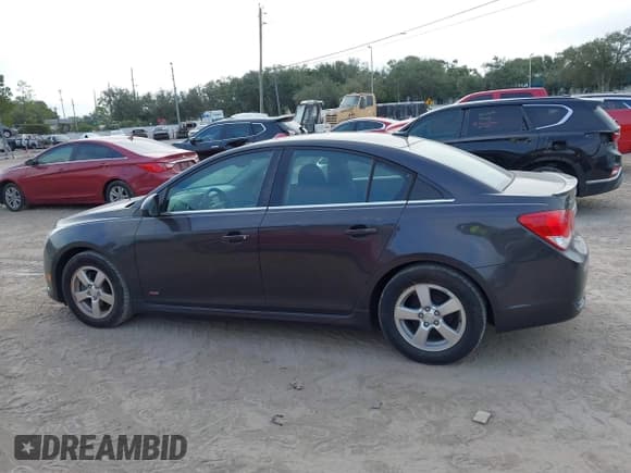 ✅ 2014 Chevrolet Cruze 1LT • VIN: 1G1PC5SB5E7140456 • Lot: 43527056. Listed on IAAI with 45,788 mi. Free auction sales archive from the USA and detailed vehicle history report at DreamBid. Image 14.