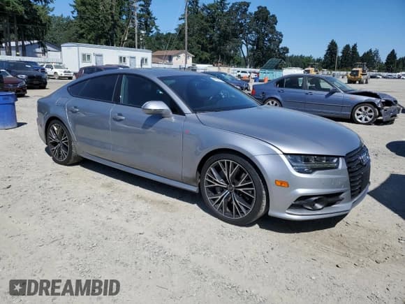 ✅ 2017 Audi A7 Premium Plus • VIN: WAUW2AFCXHN120945 • Лот: 66336185. Опубликован ранее на Copart с пробегом 82 847 миль. Бесплатный доступ к архиву аукционных продаж из США и подробный отчёт об истории автомобиля на DreamBid. Изображение 4.
