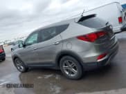 ✅ 2018 Hyundai Santa Fe 2.4L • VIN: 5NMZT3LBXJH080972 • Лот: 43542976. Опубликован ранее на IAAI с пробегом 76 144 миль. Бесплатный доступ к архиву аукционных продаж из США и подробный отчёт об истории автомобиля на DreamBid. Изображение 14.