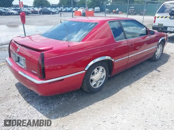 ✅ 2001 Cadillac Eldorado ESC • VIN: 1G6EL12Y31B107932 • Lot: 42723296. Wystawiony na IAAI z przebiegiem 152 482 mil. Bezpłatny archiwum sprzedaży aukcyjnych z USA i szczegółowy raport historii pojazdu na DreamBid. Zdjęcie 4.