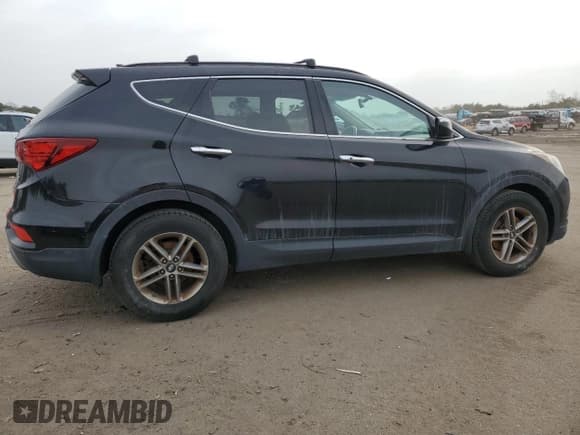 ✅ 2018 Hyundai Santa Fe 2.4L • VIN: 5NMZUDLB1JH082841 • Лот: 44533394. Опубликован ранее на Copart с пробегом 84 915 миль. Бесплатный доступ к архиву аукционных продаж из США и подробный отчёт об истории автомобиля на DreamBid. Изображение 3.