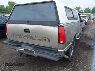 ✅ 1999 Chevrolet Silverado 2500 • VIN: 1GCGC24R2XF004021 • Lot: 42436623. Wystawiony na IAAI z przebiegiem 247 904 mil. Bezpłatny archiwum sprzedaży aukcyjnych z USA i szczegółowy raport historii pojazdu na DreamBid. Zdjęcie 4.