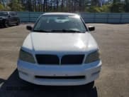 ✅ 2003 Mitsubishi Lancer ES • VIN: JA3AJ26E83U076335 • Лот: 67506825. Опубликован ранее на Copart с пробегом 143 394 миль. Бесплатный доступ к архиву аукционных продаж из США и подробный отчёт об истории автомобиля на DreamBid. Изображение 5.