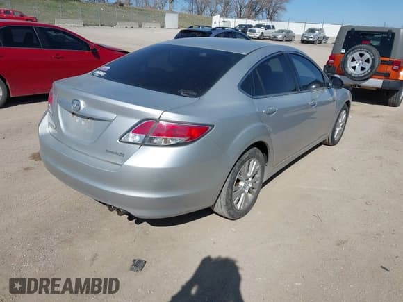 ✅ 2009 Mazda 6 i Touring • VIN: 1YVHP82A795M31562 • Lot: 41970484. Listed on IAAI with 128,724 mi. Free auction sales archive from the USA and detailed vehicle history report at DreamBid. Image 4.