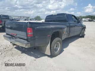 1999 Dodge 3500 z VIN 1B7MC3365XJ584328, wystawiony jako Copart lot #62157015 z przebiegiem 221 754 mil mil oraz Szkoda całkowita • Salvage title. Historia ofert i sprzedaży dostępna na DreamBid. Obrazek 3.