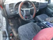 ✅ 2001 GMC Sonoma SLS • VIN: 1GTDT13W81K250249 • Лот: 46168565. Опубликован ранее на Copart с пробегом 232 508 миль. Бесплатный доступ к архиву аукционных продаж из США и подробный отчёт об истории автомобиля на DreamBid. Изображение 8.