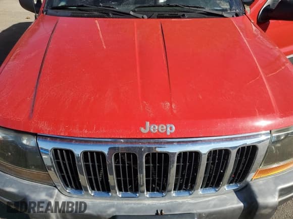✅ 2000 Jeep Grand Cherokee Laredo • VIN: 1J4GW48S1YC214915 • Lot: 82728995. Listed on Copart with 111,305 mi. Free auction sales archive from the USA and detailed vehicle history report at DreamBid. Image 12.