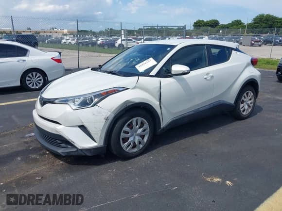 ✅ 2019 Toyota C-HR XLE • VIN: NMTKHMBX3KR085644 • Lot: 42891527. Listed on IAAI with 82,222 mi. Free auction sales archive from the USA and detailed vehicle history report at DreamBid. Image 2.