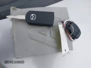 ✅ 2014 Mazda 5 Touring • VIN: JM1CW2CL7E0175902 • Lot: 43287647. Listed on IAAI with 98,037 mi. Free auction sales archive from the USA and detailed vehicle history report at DreamBid. Image 11.