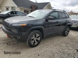 ✅ 2014 Jeep Cherokee Trailhawk • VIN: 1C4PJMBS1EW131346 • Lot: 82575235. Wystawiony na Copart z przebiegiem 148 739 mil. Bezpłatny archiwum sprzedaży aukcyjnych z USA i szczegółowy raport historii pojazdu na DreamBid. Zdjęcie 1.