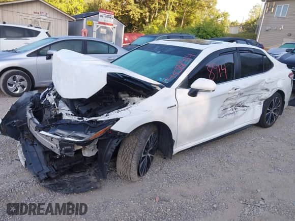 2020 Toyota Camry Hybrid SE z VIN 4T1J31AK6LU536333, wystawiony jako IAAI lot #43088914 z przebiegiem 73 421 mil mil oraz . Historia ofert i sprzedaży dostępna na DreamBid. Obrazek 2.