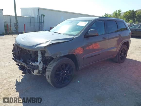 2021 Jeep Grand Cherokee Laredo X z VIN 1C4RJFAG5MC778298, wystawiony jako IAAI lot #43180266 z przebiegiem 59 715 mil mil oraz . Historia ofert i sprzedaży dostępna na DreamBid. Obrazek 2.