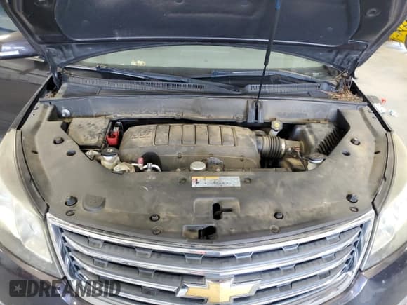 ✅ 2017 Chevrolet Traverse LT • VIN: 1GNKRGKD4HJ184797 • Lot: 69013234. Wystawiony na Copart z przebiegiem 117 937 mil. Bezpłatny archiwum sprzedaży aukcyjnych z USA i szczegółowy raport historii pojazdu na DreamBid. Zdjęcie 12.