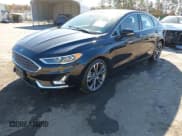 ✅ 2020 Ford Fusion Titanium • VIN: 3FA6P0D90LR193968 • Лот: 43635072. Опубликован ранее на IAAI с пробегом 70 786 миль. Бесплатный доступ к архиву аукционных продаж из США и подробный отчёт об истории автомобиля на DreamBid. Изображение 16.