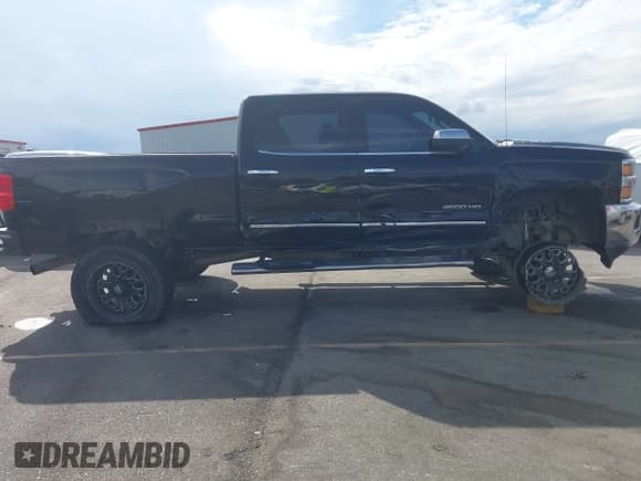 ✅ 2015 Chevrolet Silverado 2500HD LTZ • VIN: 1GC1KWE84FF609940 • Lot: 43407719. Listed on IAAI with 165,422 mi. Free auction sales archive from the USA and detailed vehicle history report at DreamBid. Image 13.