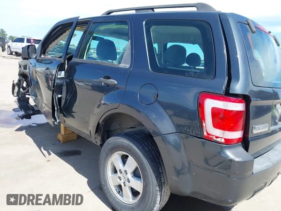 ✅ 2008 Ford Escape XLS • VIN: 1FMCU02Z28KD32661 • Lot: 42316426. Listed on IAAI with 184,552 mi. Free auction sales archive from the USA and detailed vehicle history report at DreamBid. Image 20.