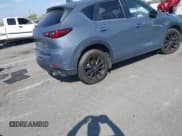 ✅ 2023 Mazda CX-5 S Carbon Edition • VIN: JM3KFBCM6P0252838 • Lot: 43248566. Wystawiony na IAAI z przebiegiem 37 599 mil. Bezpłatny archiwum sprzedaży aukcyjnych z USA i szczegółowy raport historii pojazdu na DreamBid. Zdjęcie 4.