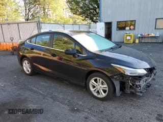 ✅ 2018 Chevrolet Cruze LT • VIN: 1G1BE5SM9J7224392 • Lot: 82199325. Listed on Copart with 156,330 mi. Free auction sales archive from the USA and detailed vehicle history report at DreamBid. Image 4.