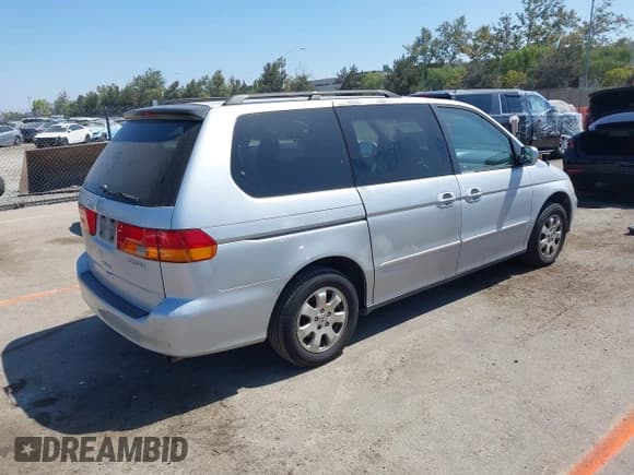 ✅ 2002 Honda Odyssey EX-L • VIN: 5FNRL18782B012133 • Lot: 42862639. Wystawiony na IAAI z przebiegiem 249 145 mil. Bezpłatny archiwum sprzedaży aukcyjnych z USA i szczegółowy raport historii pojazdu na DreamBid. Zdjęcie 4.