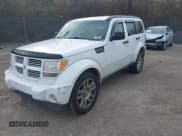 ✅ 2011 Dodge Nitro Heat • VIN: 1D4PU4GK2BW604735 • Lot: 43887161. Listed on IAAI with 127,485 mi. Free auction sales archive from the USA and detailed vehicle history report at DreamBid. Image 2.