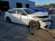 ✅ 2023 Honda Civic Sport • VIN: 2HGFE2F59PH504712 • Lot: 94761115. Listed on Copart with 71,276 mi. Free auction sales archive from the USA and detailed vehicle history report at DreamBid. Image 4.