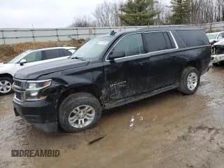 ✅ 2019 Chevrolet Suburban LS • VIN: 1GNSKGKC6KR121947 • Lot: 87117324. Listed on Copart with 127,556 mi. Free auction sales archive from the USA and detailed vehicle history report at DreamBid. Image 1.