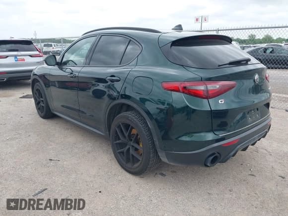 ✅ 2018 Alfa Romeo Stelvio Ti Sport • VIN: ZASFAKNN6J7C04051 • Lot: 42110788. Listed on IAAI with 90,731 mi. Free auction sales archive from the USA and detailed vehicle history report at DreamBid. Image 3.