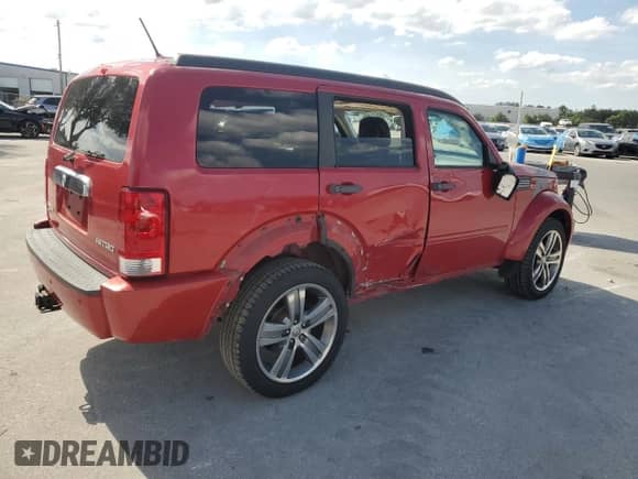 2011 Dodge Nitro Shock z VIN 1D4PT7GX1BW559691, wystawiony jako Copart lot #89531495 z przebiegiem 91 241 mil mil oraz Nie do naprawy • Non repairable. Historia ofert i sprzedaży dostępna na DreamBid. Obrazek 3.