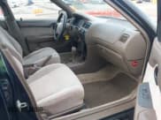 ✅ 1996 Toyota Corolla DX • VIN: 1NXBB02E6TZ449137 • Lot: 42811327. Wystawiony na IAAI z przebiegiem 323 970 mil. Bezpłatny archiwum sprzedaży aukcyjnych z USA i szczegółowy raport historii pojazdu na DreamBid. Zdjęcie 5.