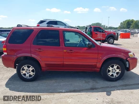 ✅ 2005 Ford Escape Limited • VIN: 1FMCU04155KA07389 • Lot: 42646492. Listed on IAAI with 106,015 mi. Free auction sales archive from the USA and detailed vehicle history report at DreamBid. Image 13.