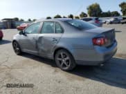 ✅ 2009 Volkswagen Jetta S • VIN: 3VWJZ71K49M151790 • Lot: 60104355. Listed on Copart with 99,476 mi. Free auction sales archive from the USA and detailed vehicle history report at DreamBid. Image 2.