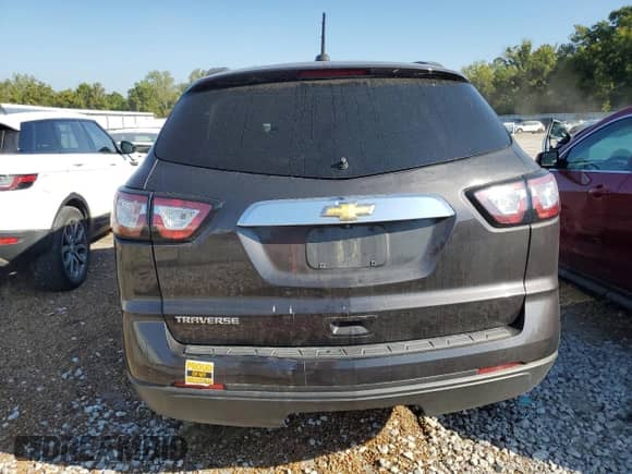 2017 Chevrolet Traverse LS z VIN 1GNKRFED3HJ255140, wystawiony jako Copart lot #81000715 z przebiegiem Nie podano mil oraz Szkoda całkowita • Salvage title. Historia ofert i sprzedaży dostępna na DreamBid. Obrazek 6.