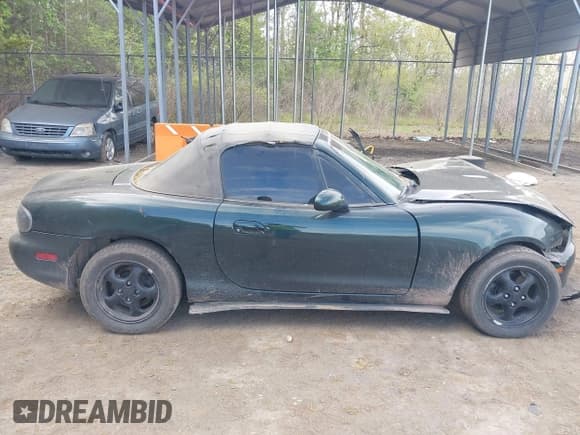 ✅ 1999 Mazda MX-5 Miata • VIN: JM1NB3531X0105029 • Lot: 42083930. Listed on IAAI with 186,885 mi. Free auction sales archive from the USA and detailed vehicle history report at DreamBid. Image 13.