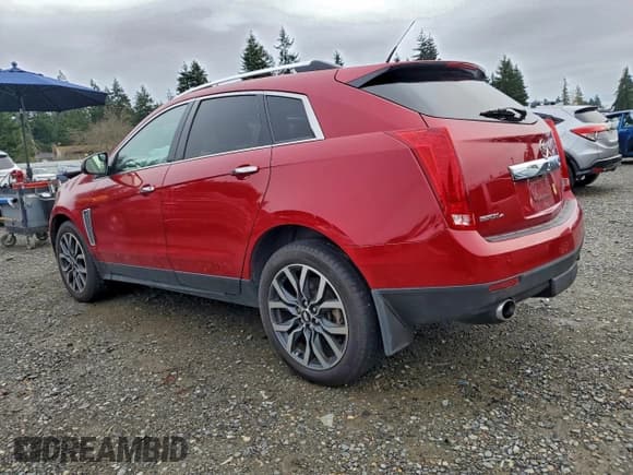 ✅ 2015 Cadillac SRX Premium Collection • VIN: 3GYFNGE37FS556888 • Лот: 96237315. Опубликован ранее на Copart с пробегом 83 277 миль. Бесплатный доступ к архиву аукционных продаж из США и подробный отчёт об истории автомобиля на DreamBid. Изображение 2.