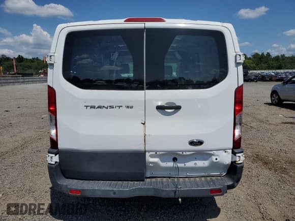 ✅ 2016 Ford Transit Cargo • VIN: 1FTYE1ZM0GKA05536 • Lot: 65212565. Listed on Copart with 146,219 mi. Free auction sales archive from the USA and detailed vehicle history report at DreamBid. Image 6.