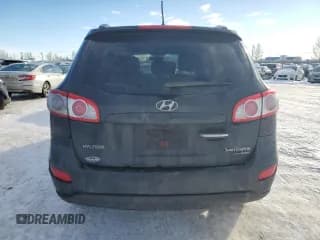 ✅ 2011 Hyundai Santa Fe SE • VIN: 5XYZHDAG3BG016225 • Lot: 82669004. Listed on Copart with 188,595 mi. Free auction sales archive from the USA and detailed vehicle history report at DreamBid. Image 6.