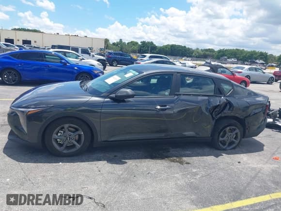 ✅ 2025 Kia K4 LXS • VIN: 3KPFT4DE1SE021125 • Lot: 43012476. Listed on IAAI with 16,563 mi. Free auction sales archive from the USA and detailed vehicle history report at DreamBid. Image 14.