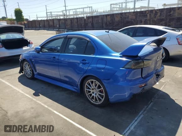 ✅ 2015 Mitsubishi Lancer Evolution GSR • VIN: JA32W8FV6FU020892 • Lot: 52443465. Wystawiony na Copart z przebiegiem 75 705 mil. Bezpłatny archiwum sprzedaży aukcyjnych z USA i szczegółowy raport historii pojazdu na DreamBid. Zdjęcie 2.