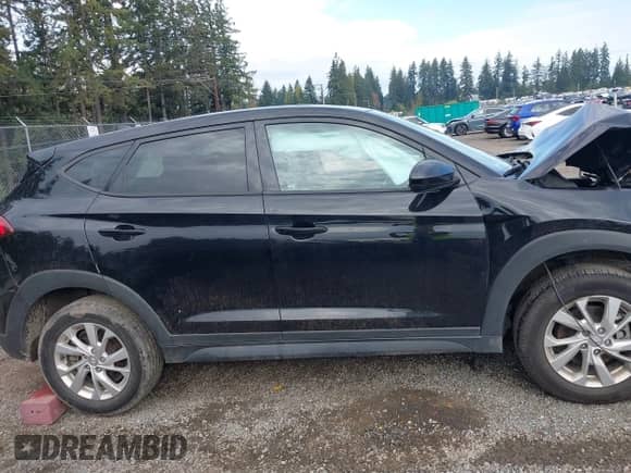 2019 Hyundai Tucson SE z VIN KM8J2CA47KU883670, wystawiony jako IAAI lot #43503613 z przebiegiem 51 899 mil mil oraz . Historia ofert i sprzedaży dostępna na DreamBid. Obrazek 13.