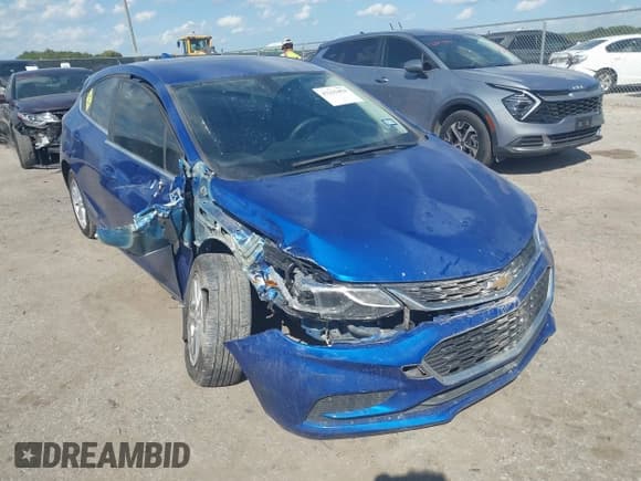 ✅ 2018 Chevrolet Cruze LT • VIN: 3G1BE6SM2JS655194 • Lot: 43293454. Listed on IAAI with 119,903 mi. Free auction sales archive from the USA and detailed vehicle history report at DreamBid. Image 1.