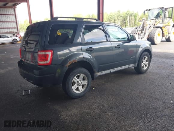 ✅ 2009 Ford Escape Hybrid • VIN: 1FMCU493X9KA99123 • Лот: 42283198. Опубликован ранее на IAAI с пробегом 321 414 миль. Бесплатный доступ к архиву аукционных продаж из США и подробный отчёт об истории автомобиля на DreamBid. Изображение 4.