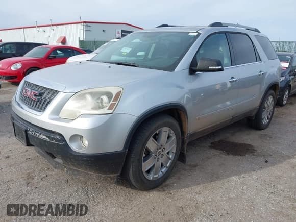 ✅ 2010 GMC Acadia SLT2 • VIN: 1GKLRNED8AJ164026 • Лот: 43900562. Опубликован ранее на IAAI с пробегом 185 714 миль. Бесплатный доступ к архиву аукционных продаж из США и подробный отчёт об истории автомобиля на DreamBid. Изображение 2.