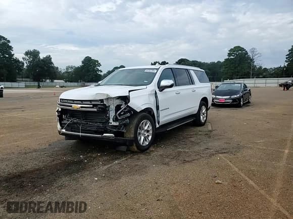 ✅ 2023 Chevrolet Suburban Premier • VIN: 1GNSCFKD7PR470834 • Lot: 84462395. Listed on Copart with 52,720 mi. Free auction sales archive from the USA and detailed vehicle history report at DreamBid. Image 14.