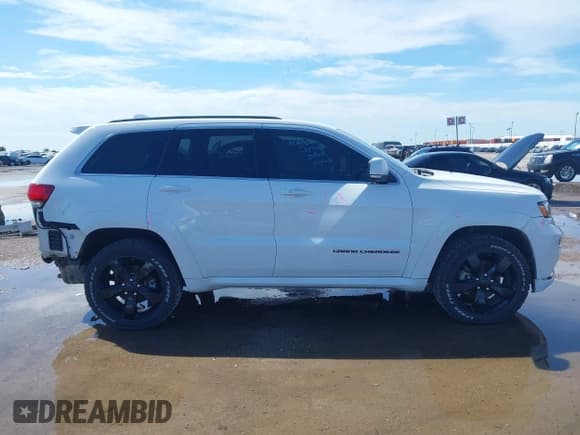 ✅ 2015 Jeep Grand Cherokee Overland • VIN: 1C4RJFCG0FC213585 • Лот: 42456563. Опубликован ранее на IAAI с пробегом 100 974 миль. Бесплатный доступ к архиву аукционных продаж из США и подробный отчёт об истории автомобиля на DreamBid. Изображение 13.