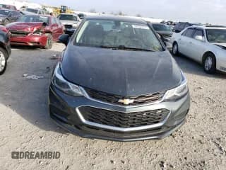 ✅ 2018 Chevrolet Cruze LT • VIN: 3G1BE6SM4JS631141 • Lot: 70752372. Wystawiony na Copart z przebiegiem 123 383 mil. Bezpłatny archiwum sprzedaży aukcyjnych z USA i szczegółowy raport historii pojazdu na DreamBid. Zdjęcie 5.