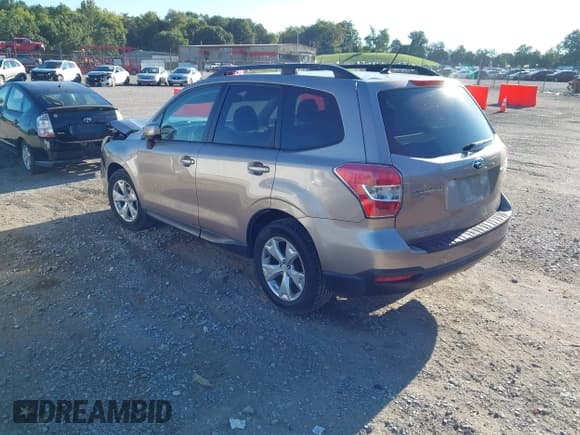 ✅ 2014 Subaru Forester Premium • VIN: JF2SJADC1EH555436 • Lot: 43054222. Listed on IAAI with 103,667 mi. Free auction sales archive from the USA and detailed vehicle history report at DreamBid. Image 3.