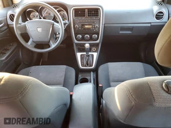 2011 Dodge Caliber Mainstreet с VIN 1B3CB3HA1BD254920, выставлен на аукционе Copart как лот 79437504 с пробегом 97 833 миль миль и Списание • Salvage title. История ставок и продаж доступна на DreamBid. Изображение 8.